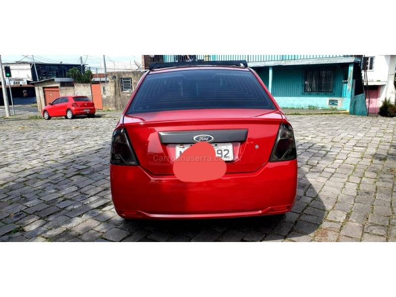 FORD - FIESTA - 2011/2011 - Vermelha - R$ 31.900,00