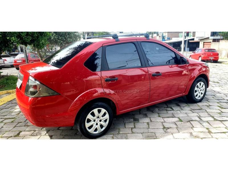 FORD - FIESTA - 2011/2011 - Vermelha - R$ 31.900,00